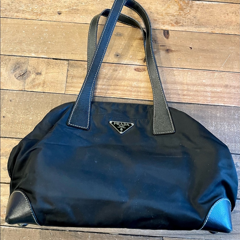 Prada Nylon 2 Handle Tote with leather handles and corners of base.